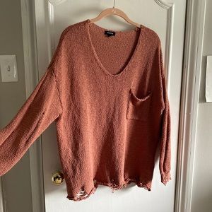 Distressed sweater